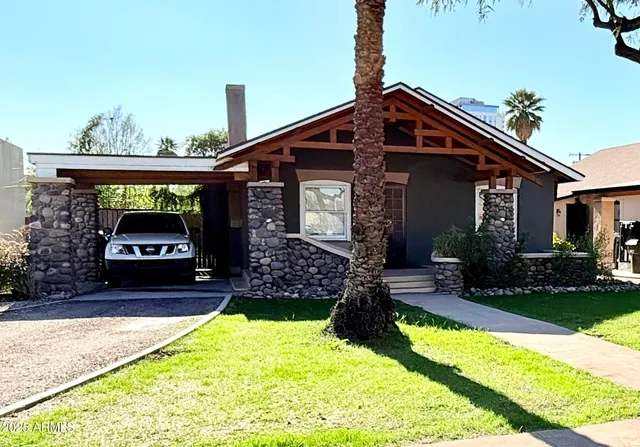 a front view of a house with yard