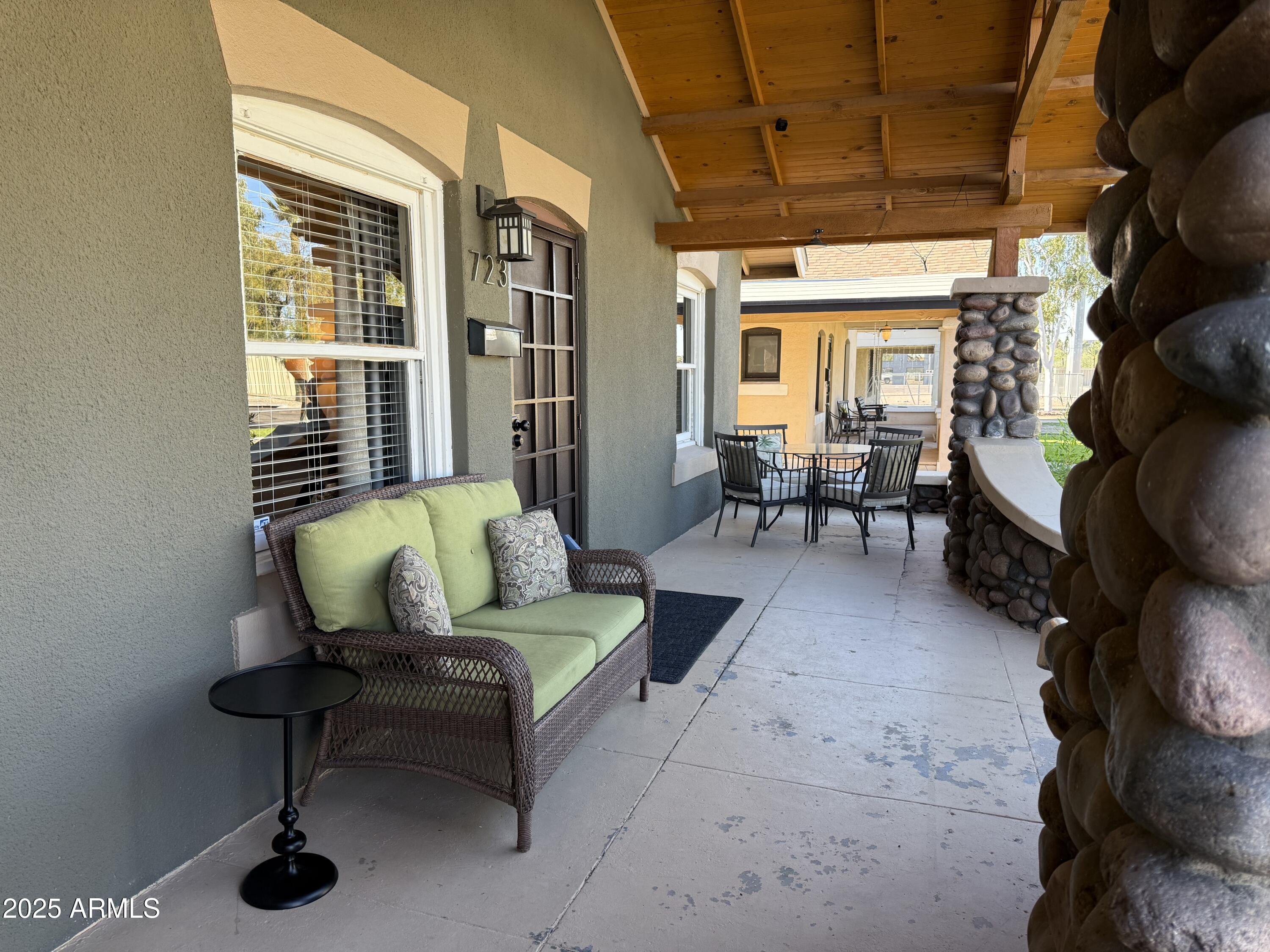 723 East Moreland Street Phoenix, AZ 85006 - Photo 4 of 25 a living room with furniture and a window