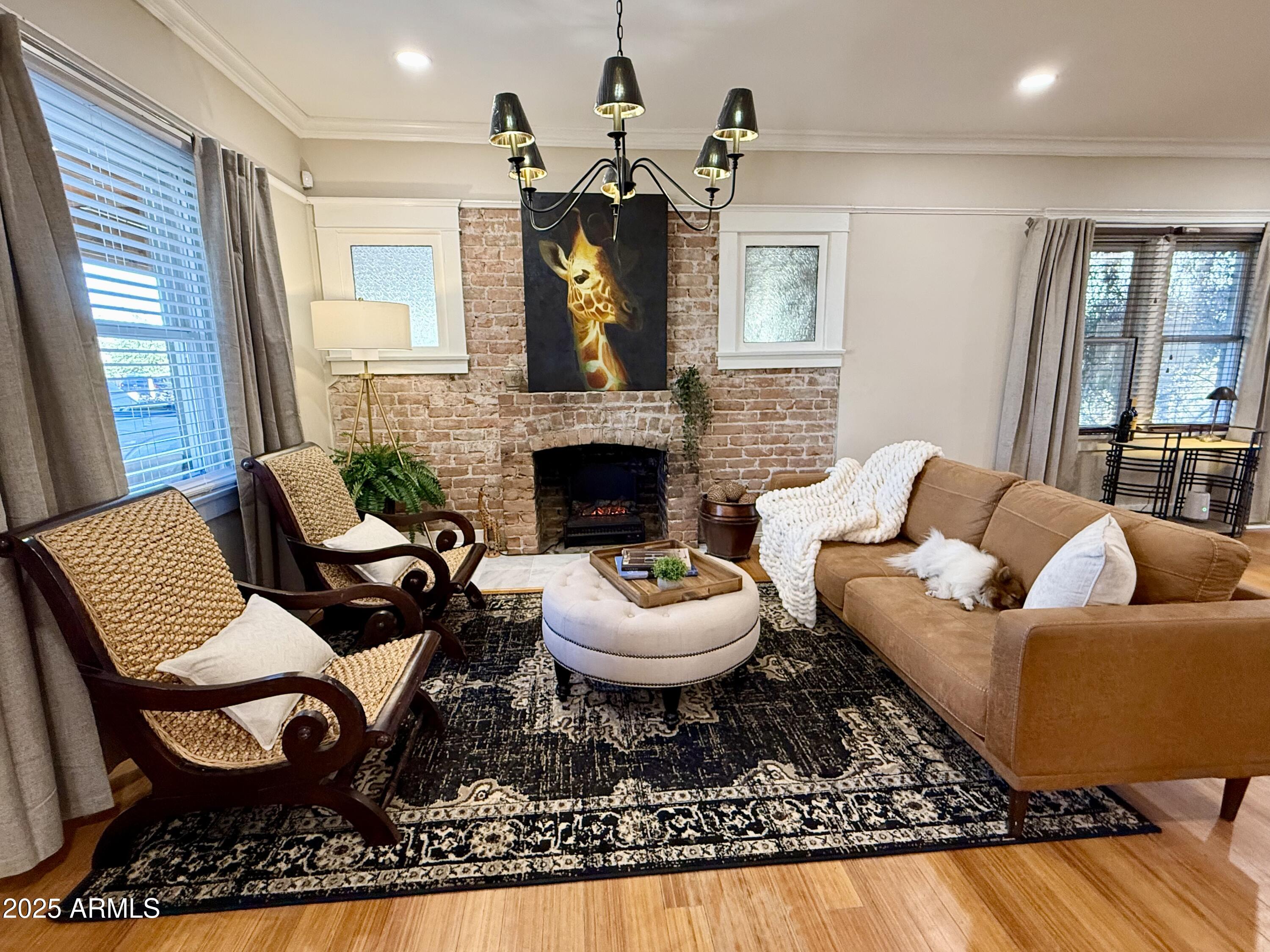 723 East Moreland Street Phoenix, AZ 85006 - Photo 6 of 25 a living room with furniture and a fireplace