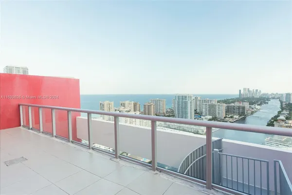 a view of a balcony with city view