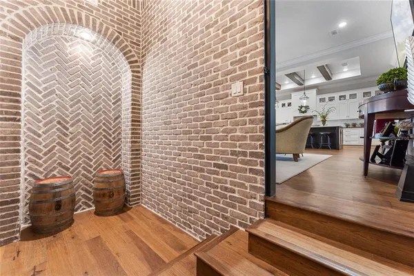 a kitchen with a refrigerator and cabinets