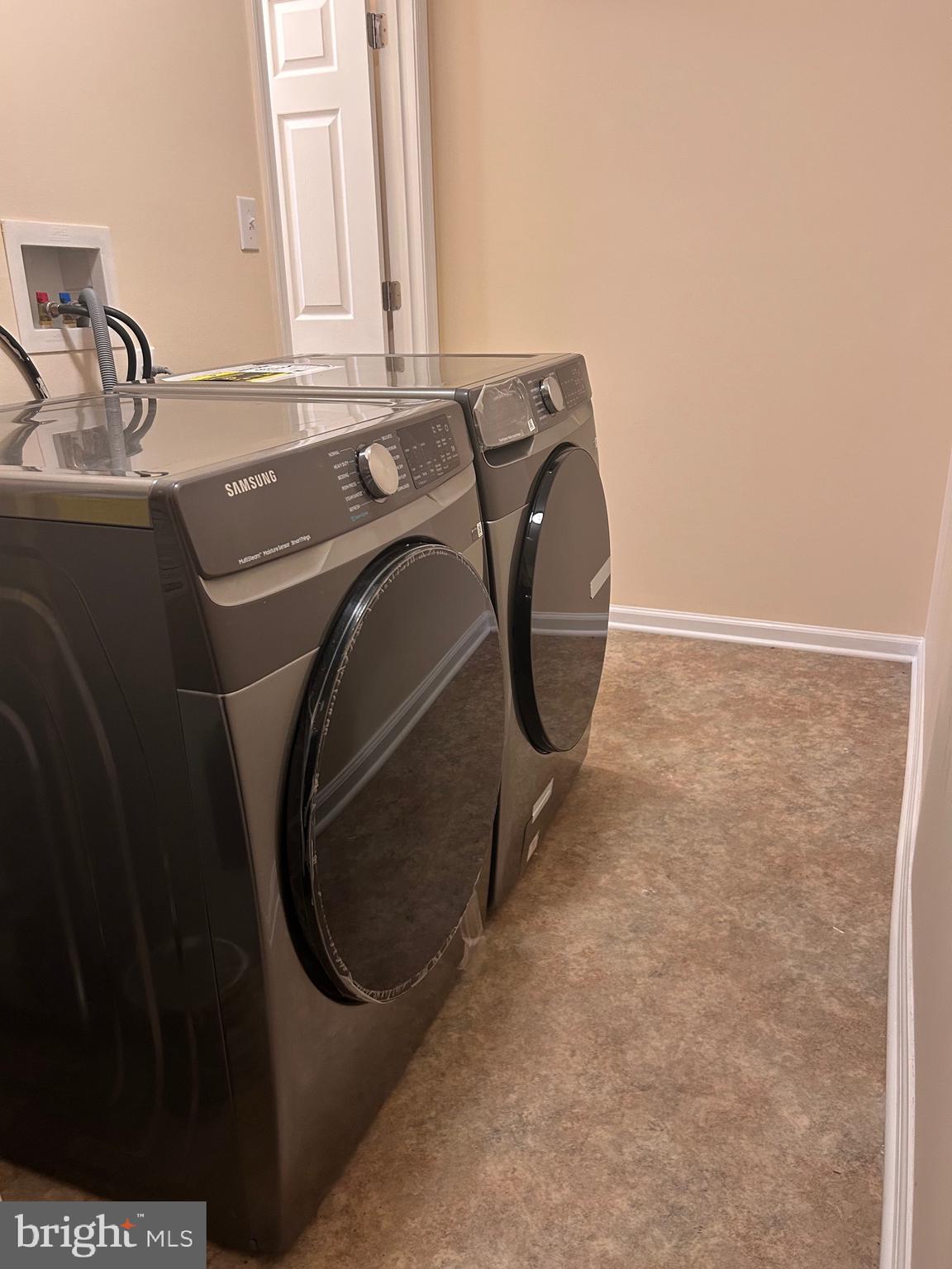 7617 Windsor Mill Road Windsor Mill, MD 21244 - Photo 19 of 49 a utility room with dryer and washer