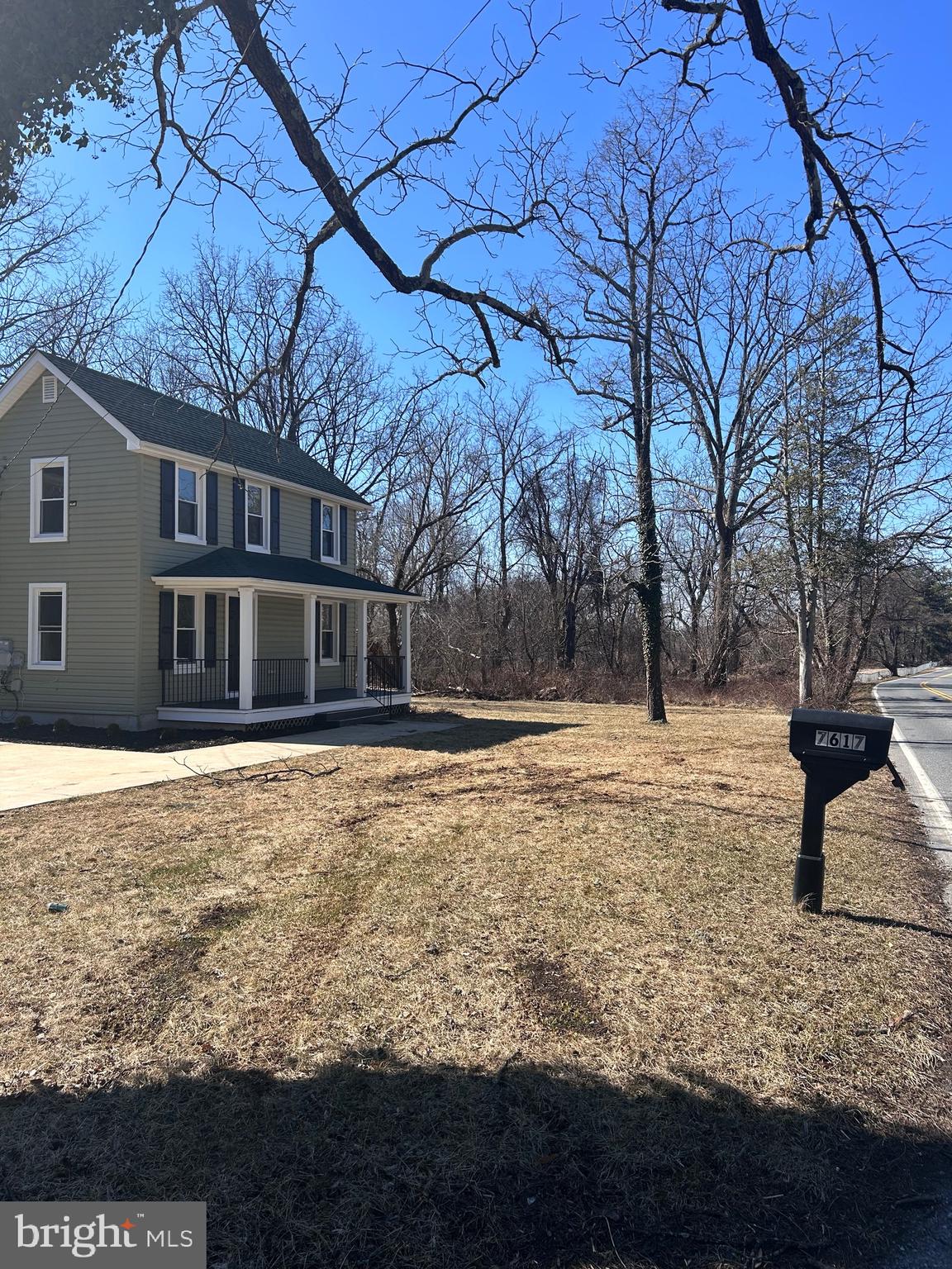 7617 Windsor Mill Road Windsor Mill, MD 21244 - Photo 3 of 49 a swimming pool with outdoor seating and yard