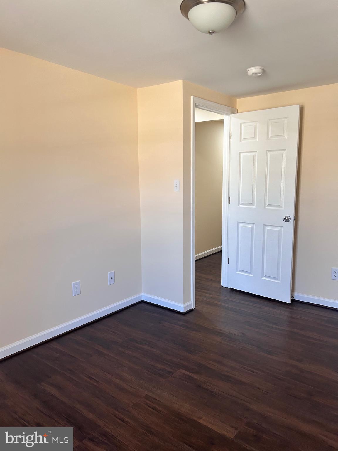 7617 Windsor Mill Road Windsor Mill, MD 21244 - Photo 32 of 49 a view of a room with wooden floor