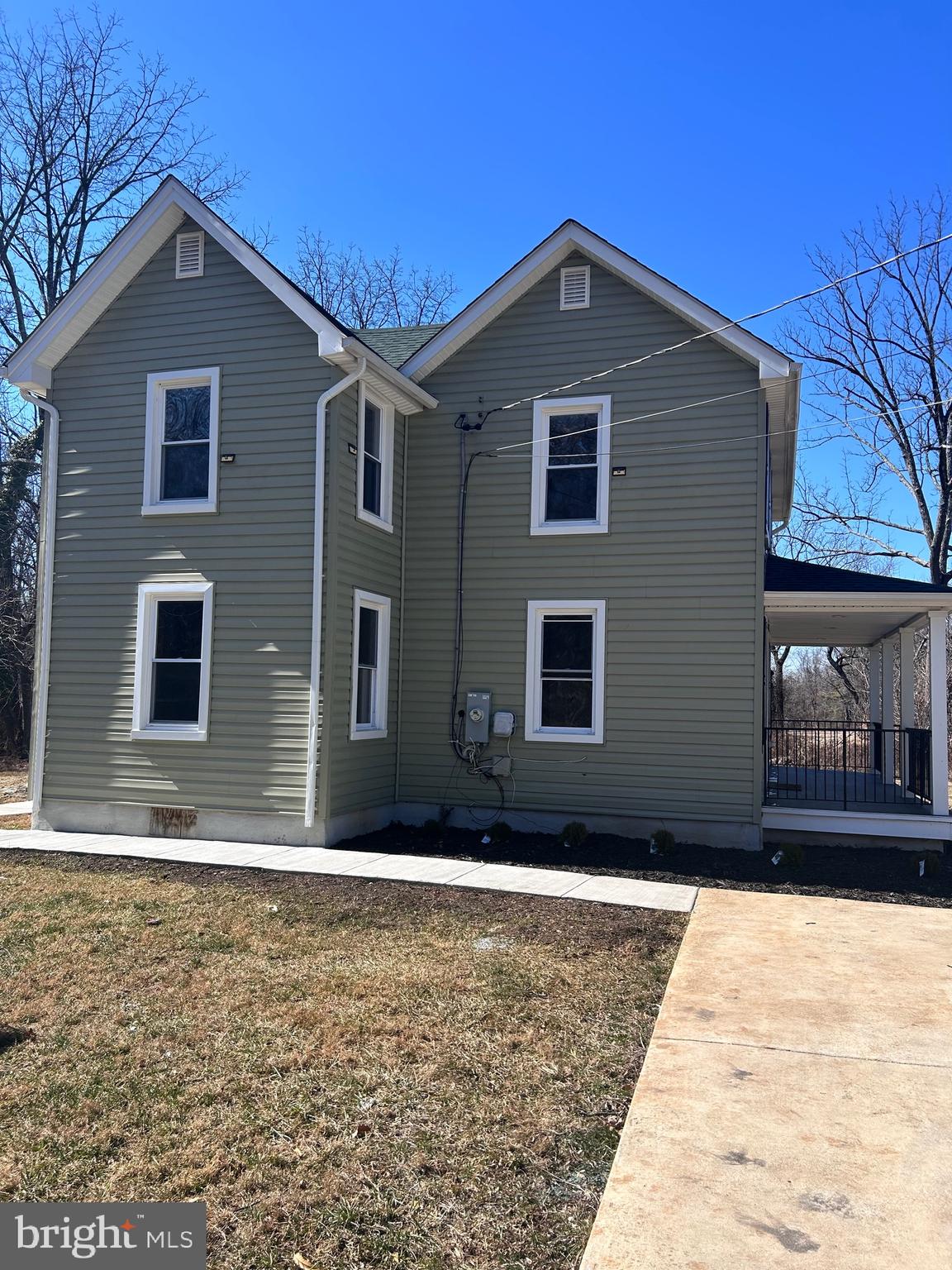 7617 Windsor Mill Road Windsor Mill, MD 21244 - Photo 46 of 49 a front view of a house with a yard