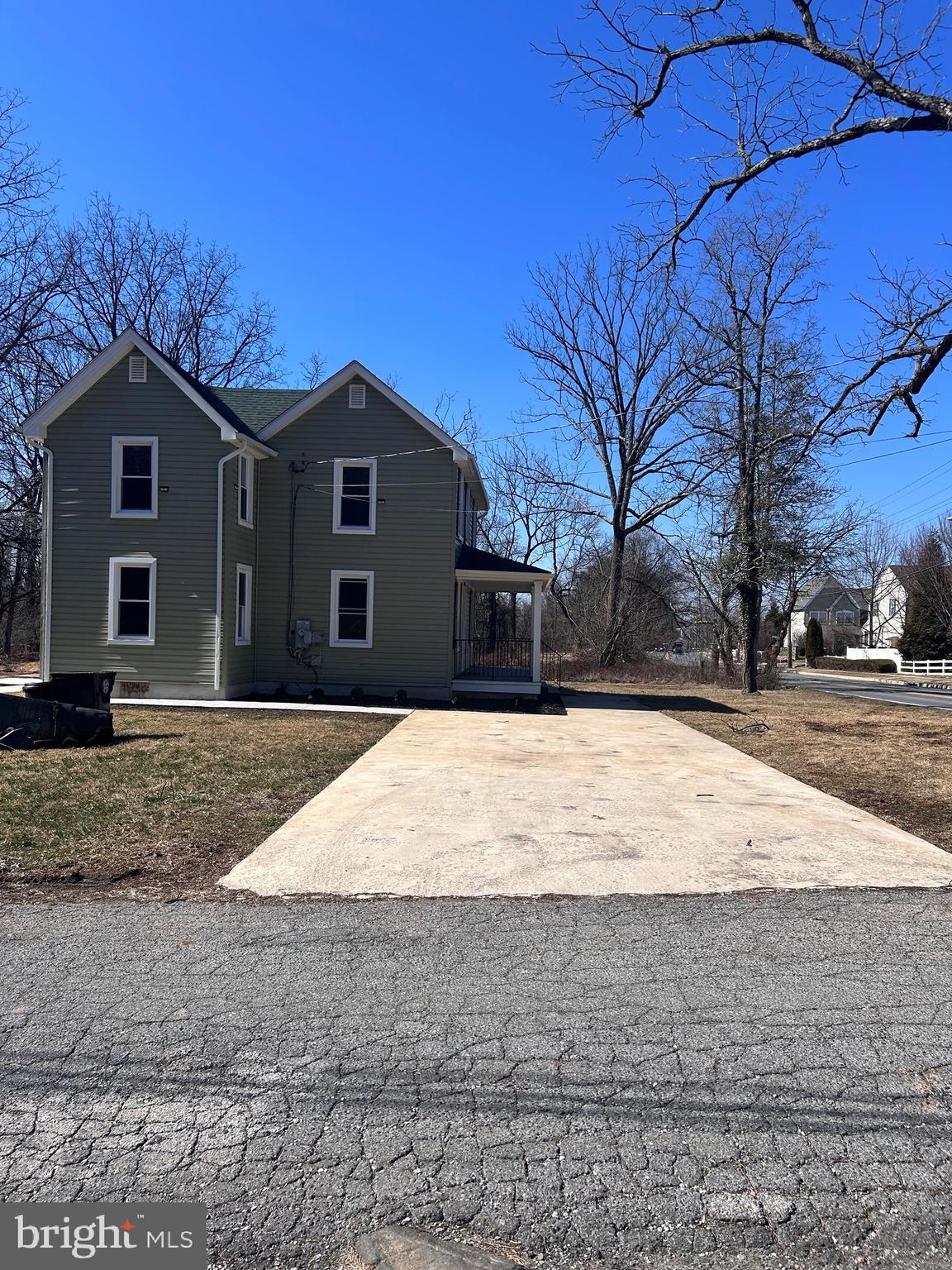 7617 Windsor Mill Road Windsor Mill, MD 21244 - Photo 47 of 49 a front view of a house with a yard