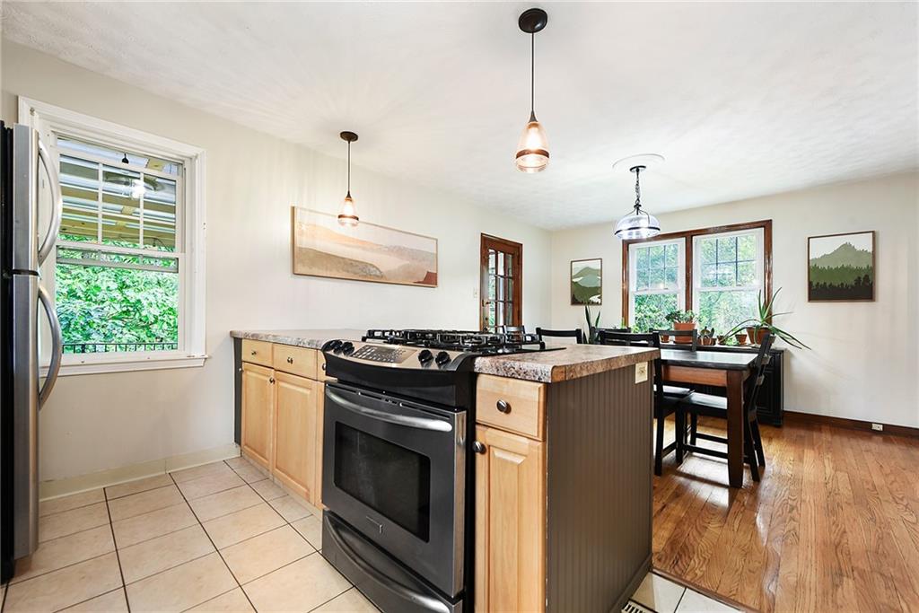 4043 Shoreham Street Pittsburgh, PA 15212 - Photo 19 of 45 a kitchen with stove and cabinets