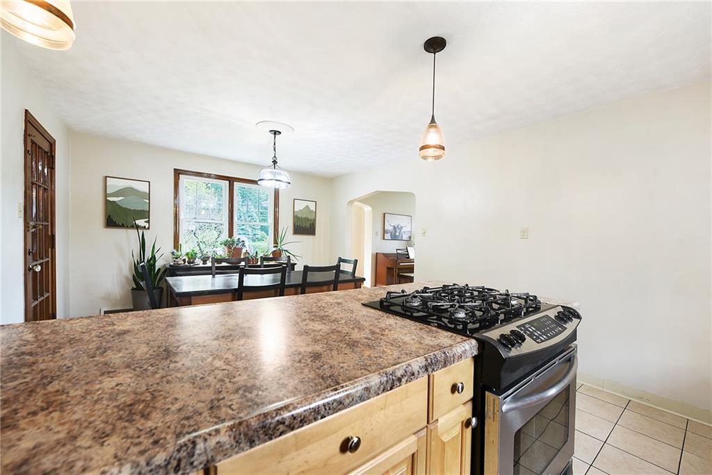 4043 Shoreham Street Pittsburgh, PA 15212 - Photo 20 of 45 a kitchen with sink stove and window