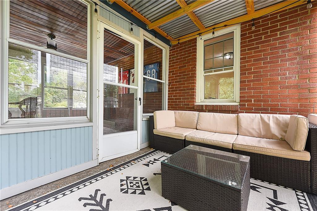 4043 Shoreham Street Pittsburgh, PA 15212 - Photo 25 of 45 a living room with furniture and a window
