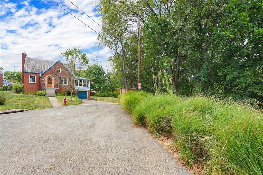 4043 Shoreham Street Pittsburgh, PA 15212 - Photo 3 of 45 a house with green field in front of it