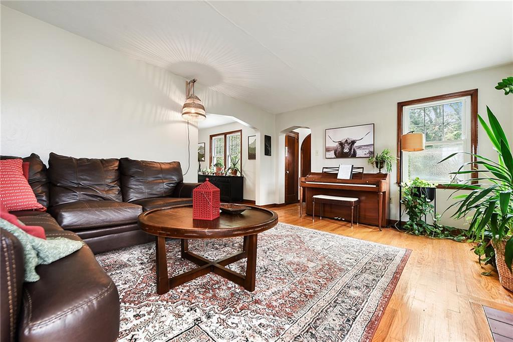 4043 Shoreham Street Pittsburgh, PA 15212 - Photo 6 of 45 a living room with furniture and wooden floor