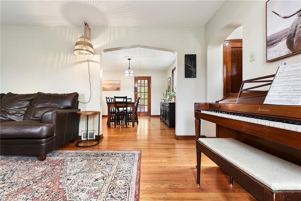 4043 Shoreham Street Pittsburgh, PA 15212 - Photo 8 of 45 a living room with furniture and wooden floor