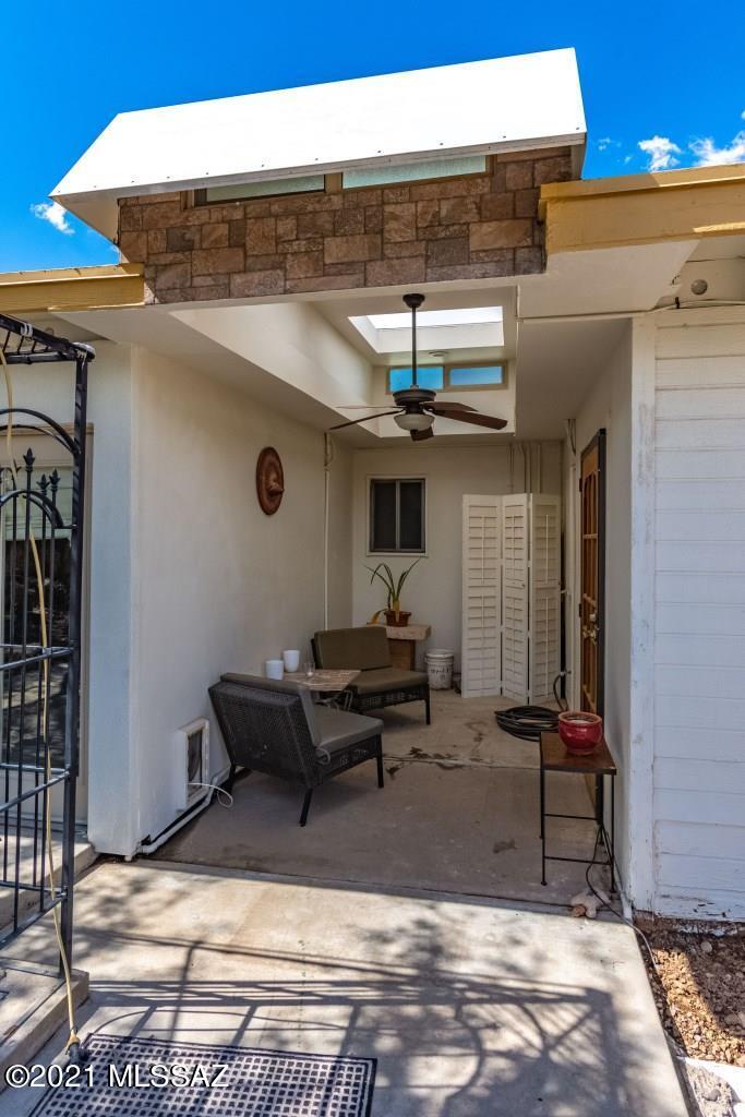 1901 West Romany Road Tucson, AZ 85713 - Photo 31 of 37 a view of a patio with table and chairs with wooden floor
