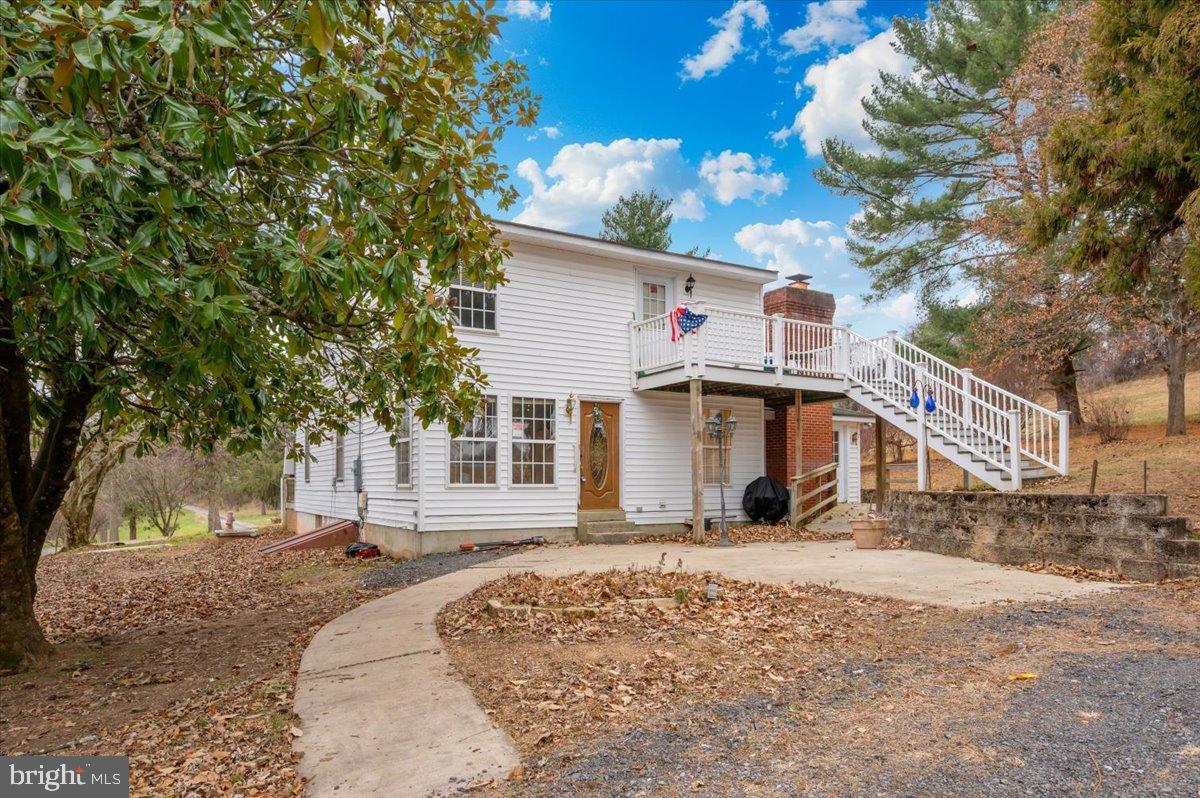10891 Bethesda Church Road Damascus, MD 20872 - Photo 25 of 51 a front view of a house with a yard