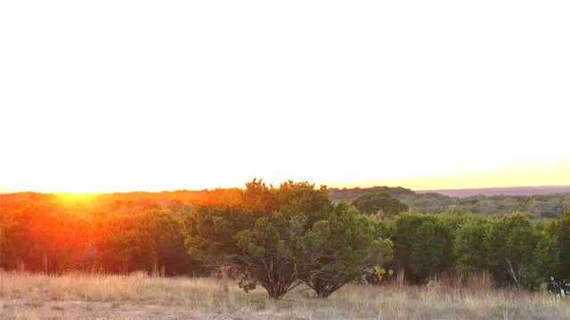 a view of mountain with lake view