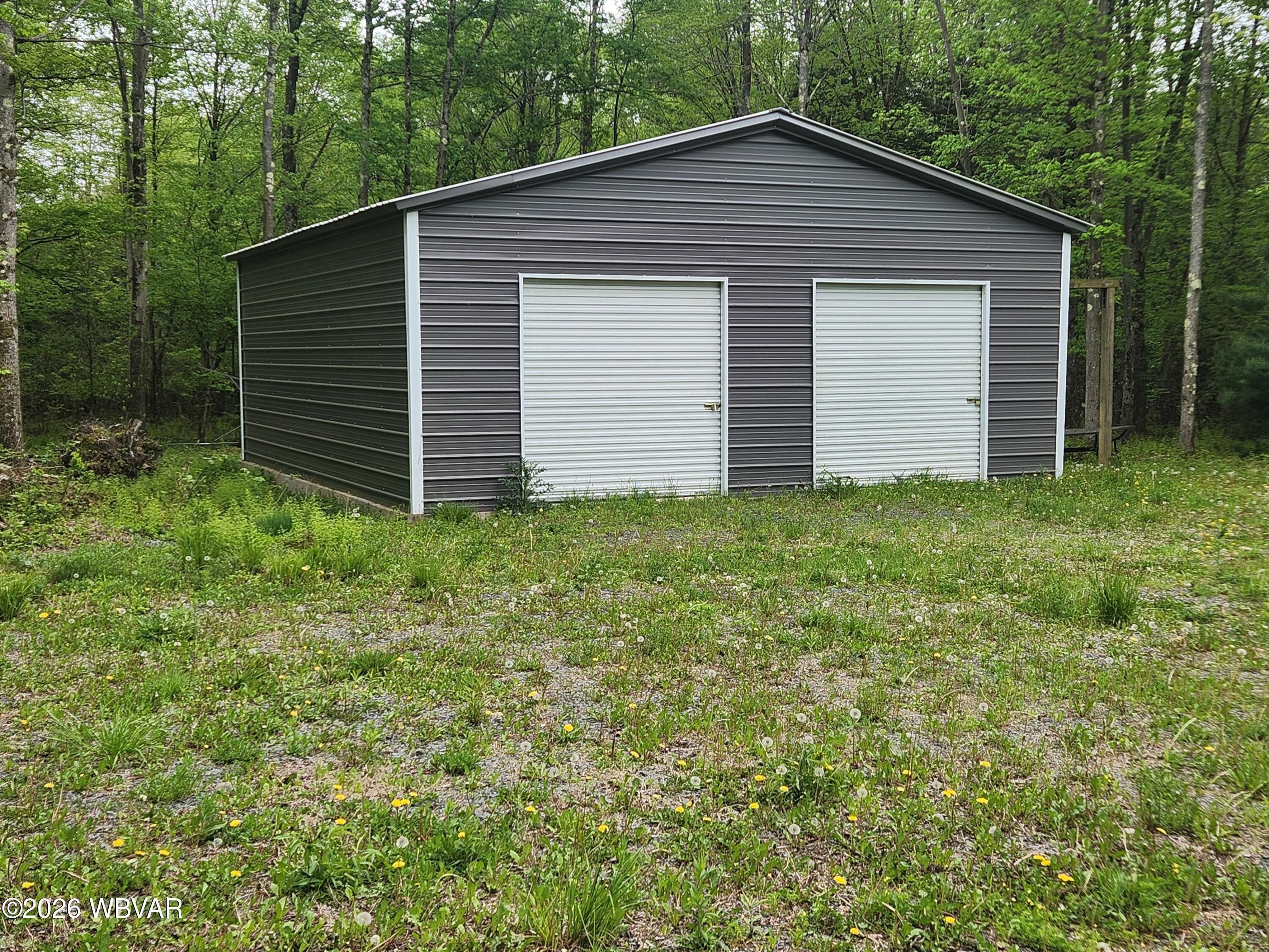 980 State Rte 4007 Forksville, PA 18616 - Photo 5 of 31 Manual garage doors front of Pole Barn