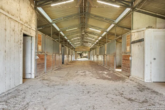 a view of a room with wooden walls