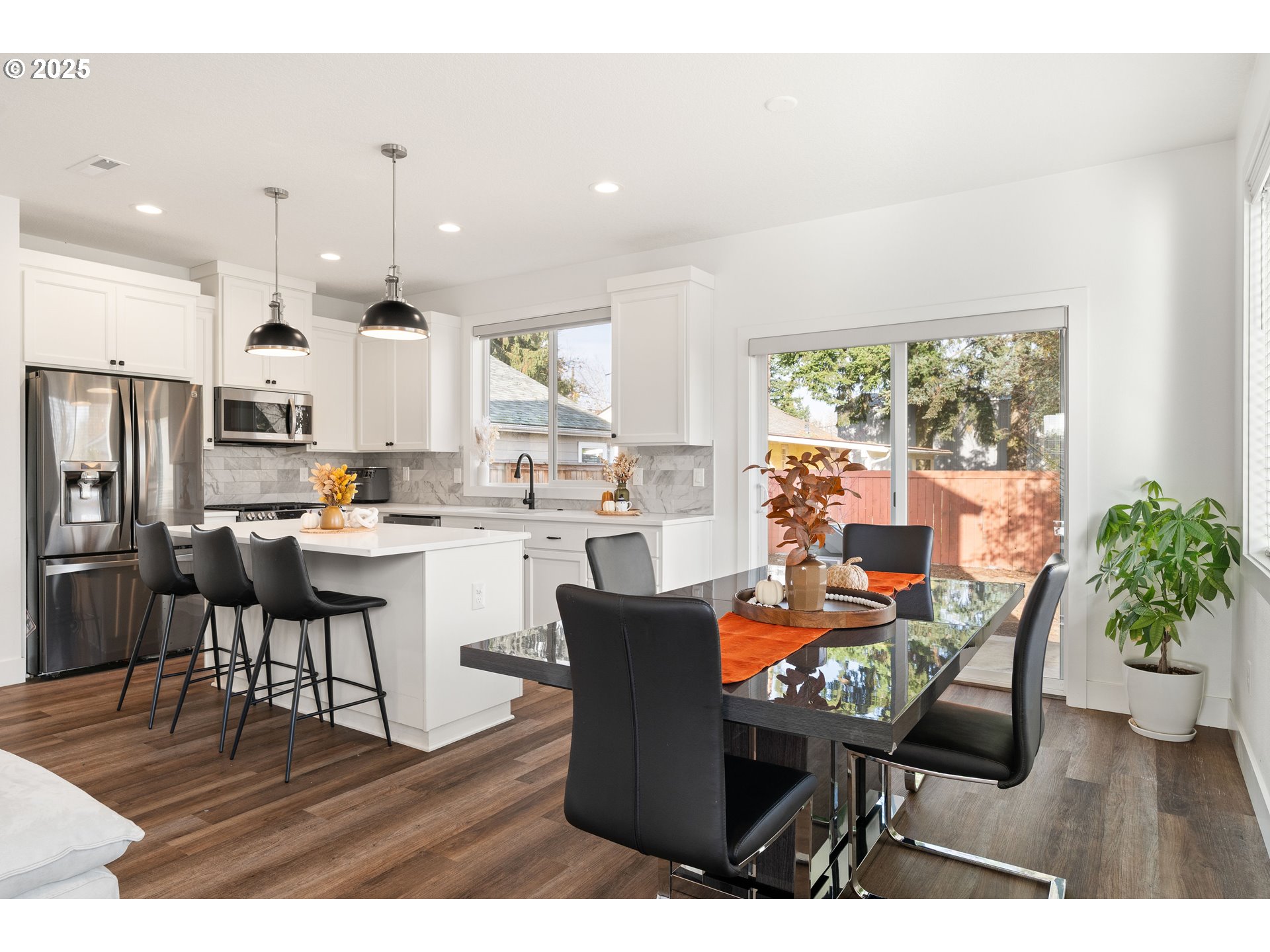 6421 Southeast Cooper Street Portland, OR 97206 - Photo 21 of 44 a outdoor dining space with furniture and kitchen view