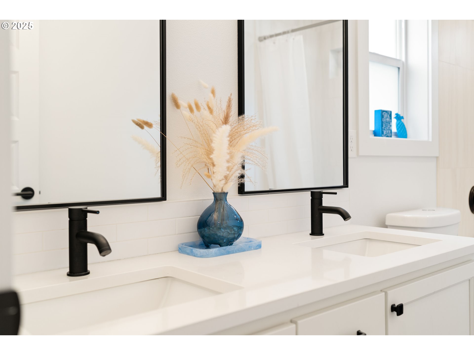 6421 Southeast Cooper Street Portland, OR 97206 - Photo 30 of 44 a bathroom with a sink and a mirror