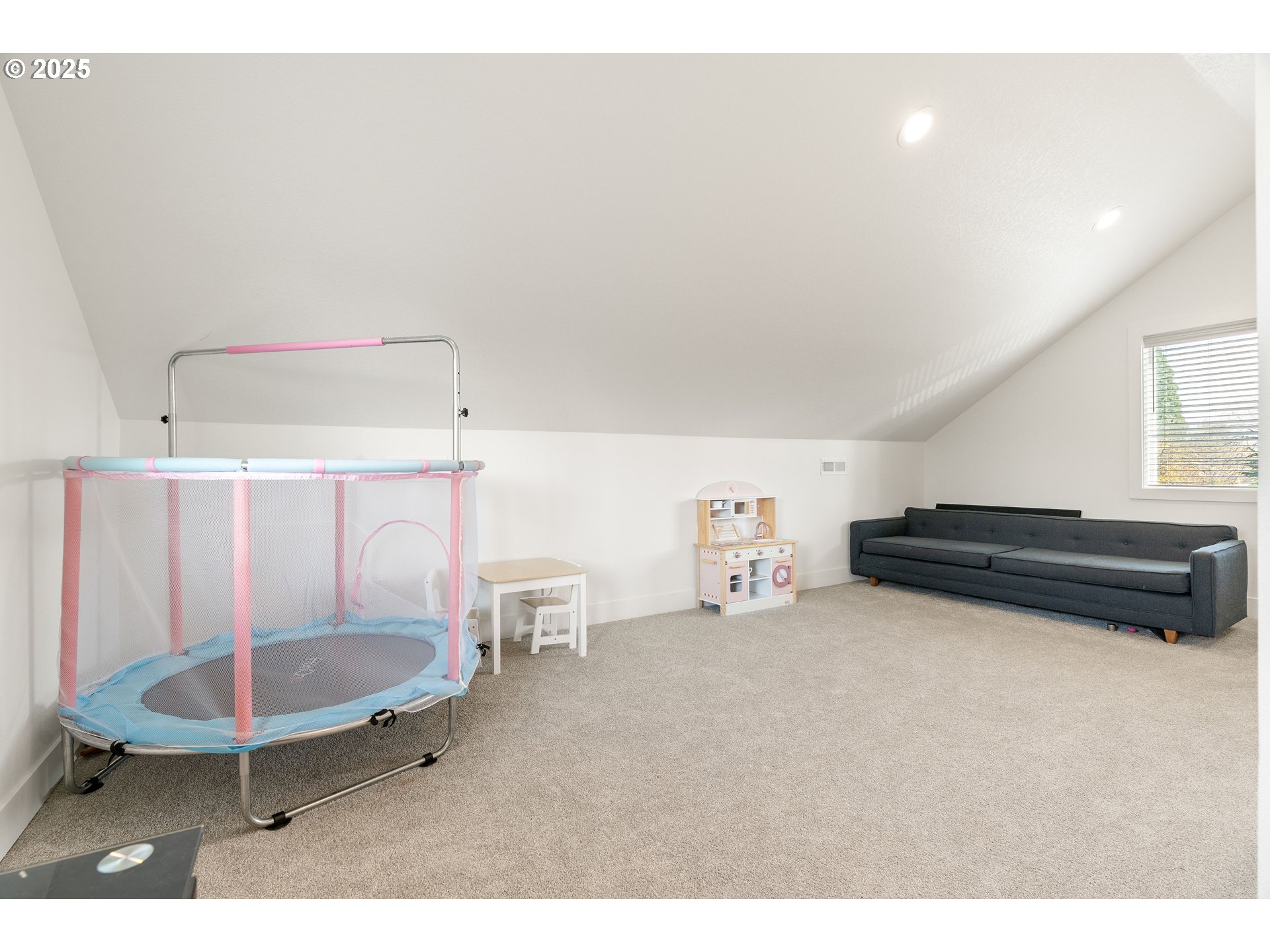 6421 Southeast Cooper Street Portland, OR 97206 - Photo 34 of 44 a room with gym equipment and large window