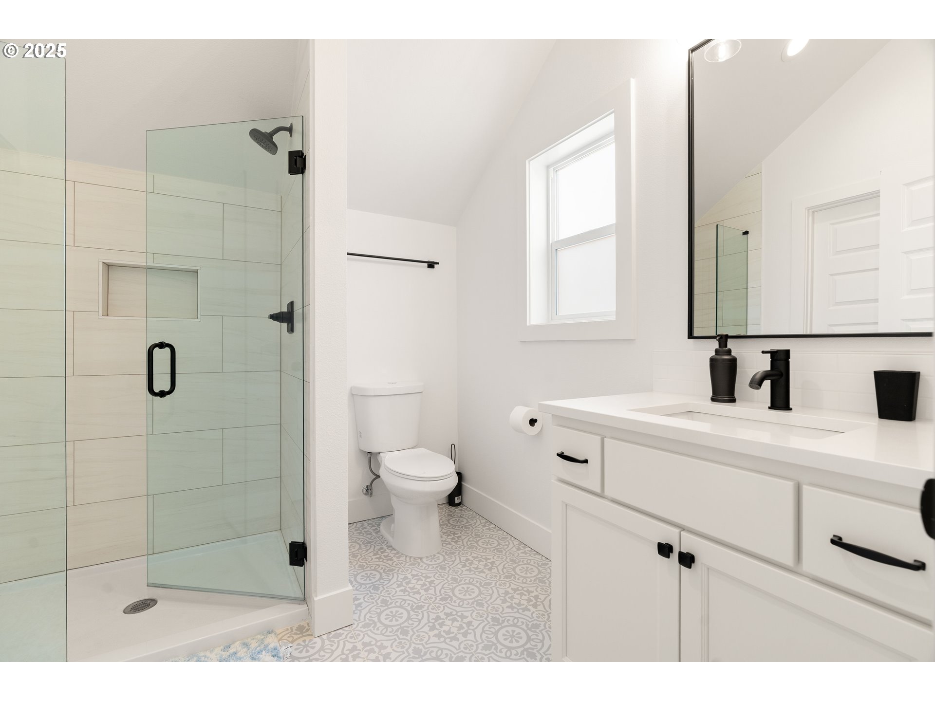 6421 Southeast Cooper Street Portland, OR 97206 - Photo 36 of 44 a bathroom with a sink a toilet and shower