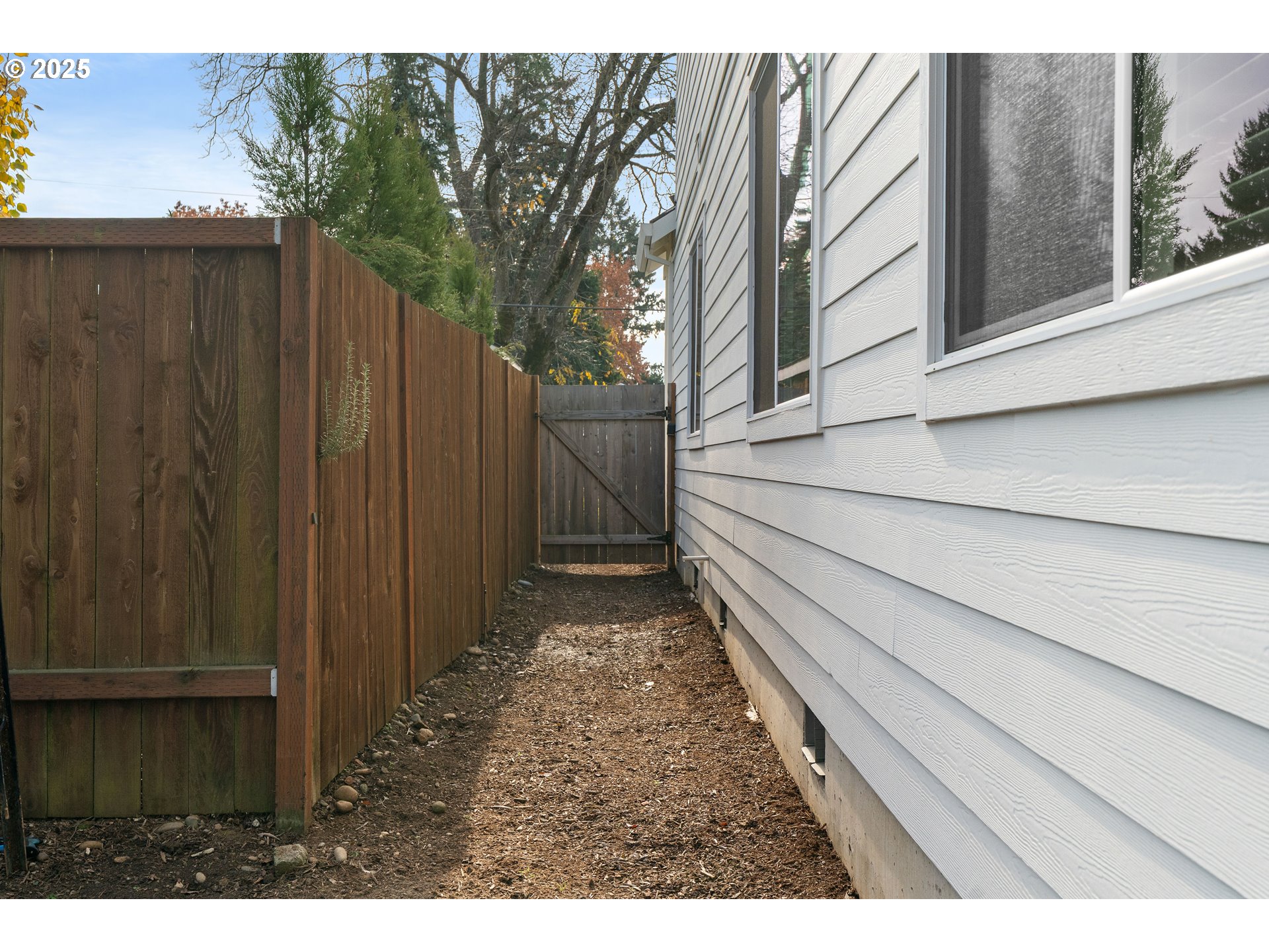 6421 Southeast Cooper Street Portland, OR 97206 - Photo 39 of 44 a view of a backyard with pathway