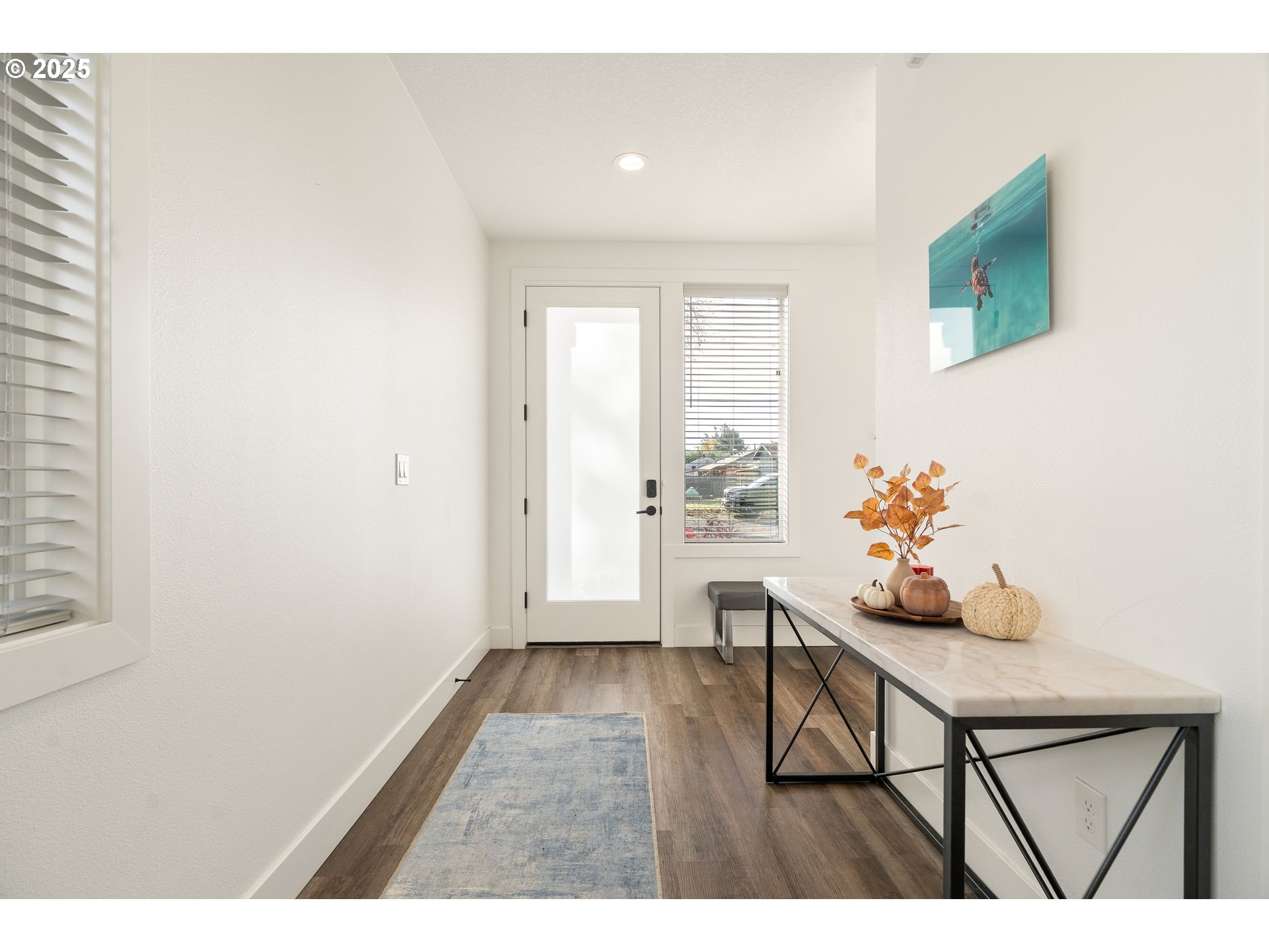 6421 Southeast Cooper Street Portland, OR 97206 - Photo 6 of 44 a room with furniture and wooden floor