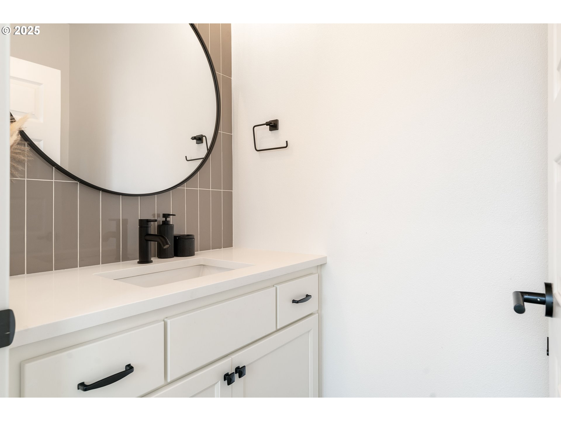 6421 Southeast Cooper Street Portland, OR 97206 - Photo 8 of 44 a bathroom with a sink and a mirror