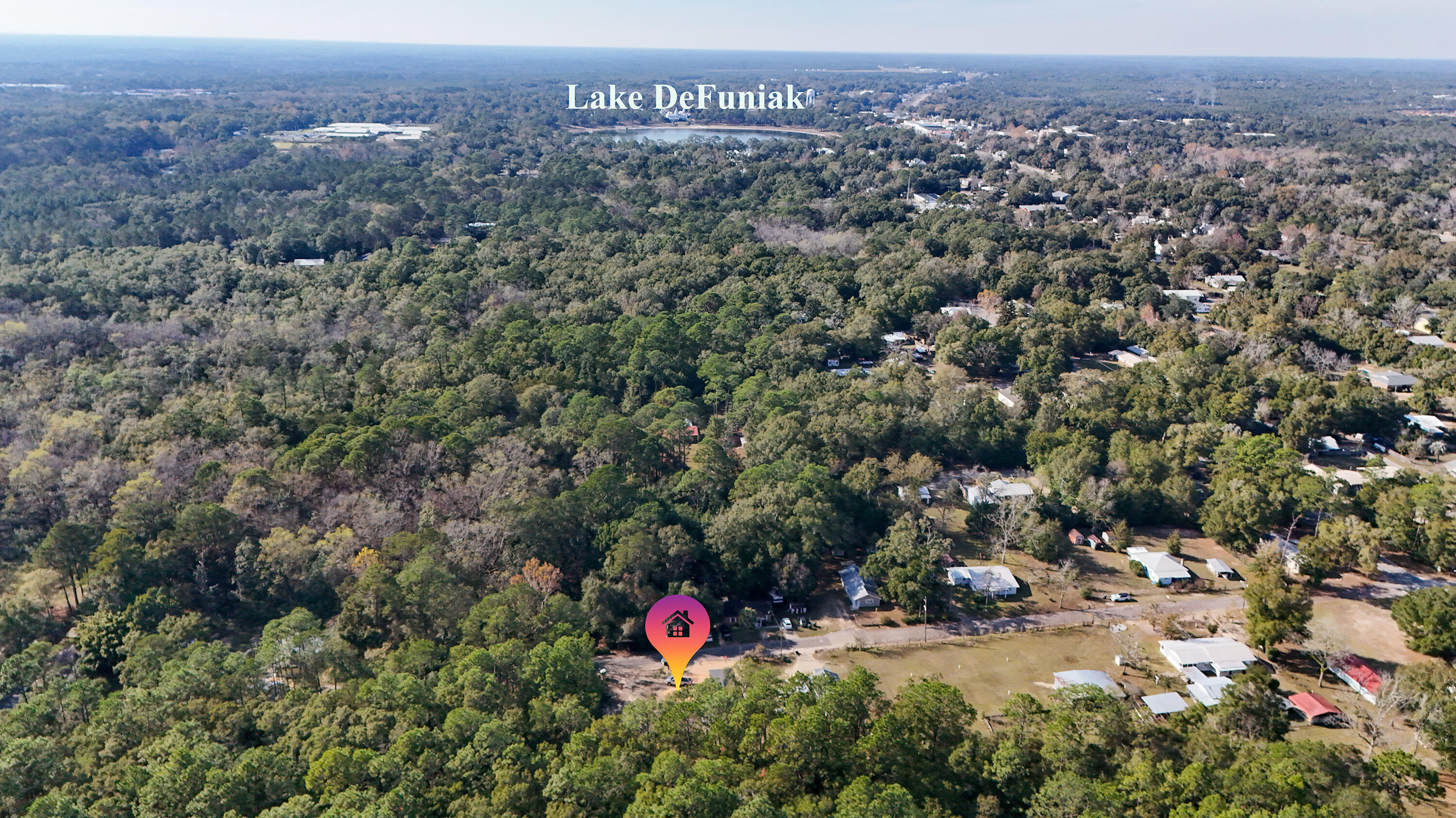 119 Loftin Street DeFuniak Springs, FL 32435 - Photo 11 of 15 an aerial view of a house with a yard
