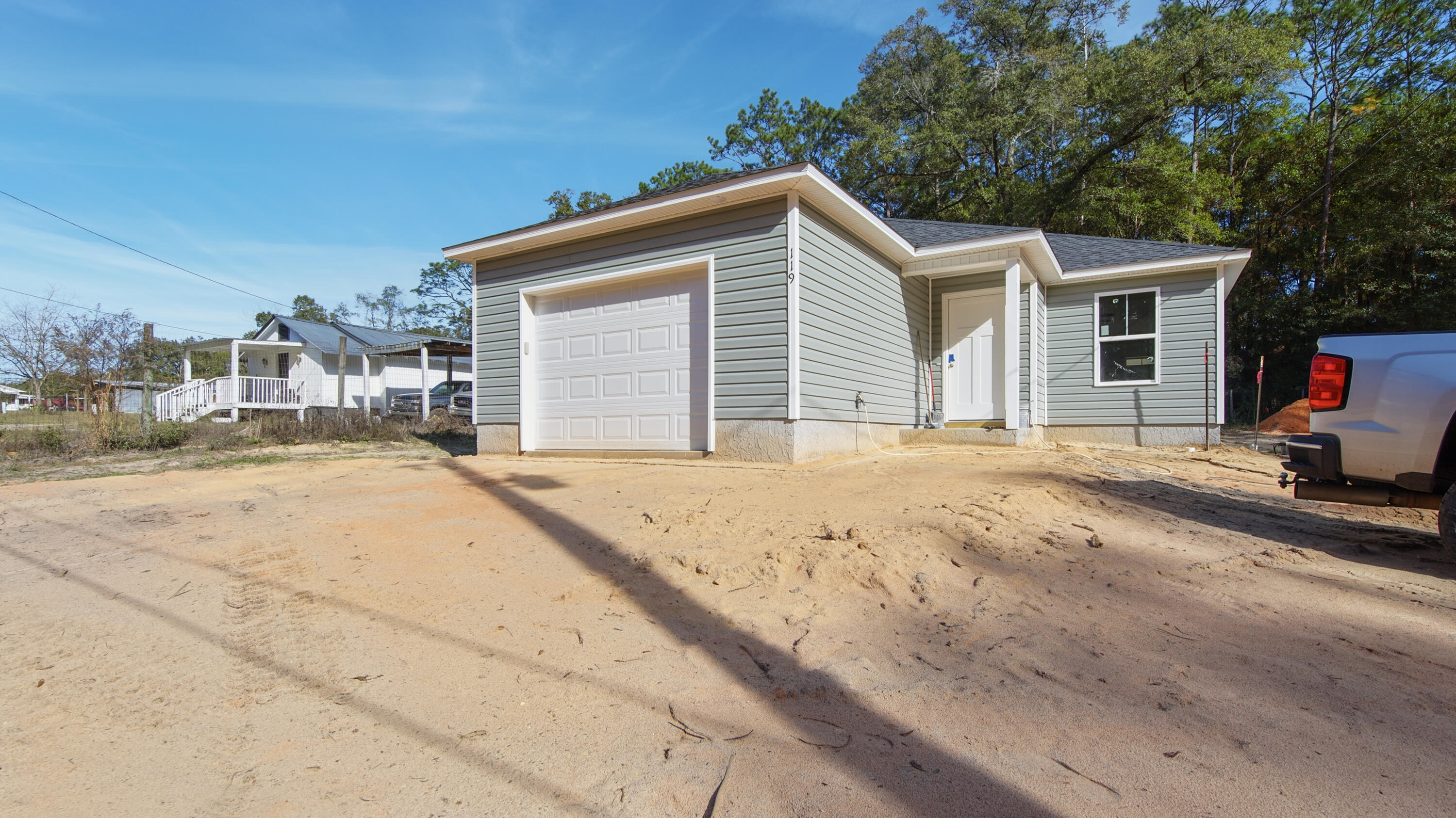 119 Loftin Street DeFuniak Springs, FL 32435 - Photo 15 of 15 a view of a house with a patio