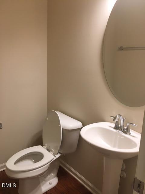 134 Zante Currant Road, Unit 134 Durham, NC 27703 - Photo 6 of 14 a bathroom with a toilet and a sink