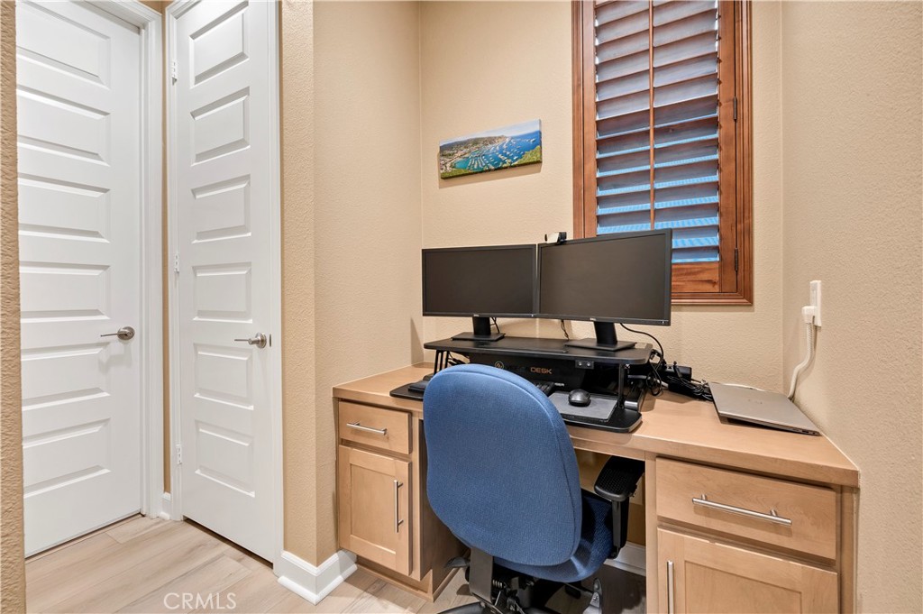 39320 Brunello Way Temecula, CA 92591 - Photo 16 of 52 a view of a workspace with furniture and a window
