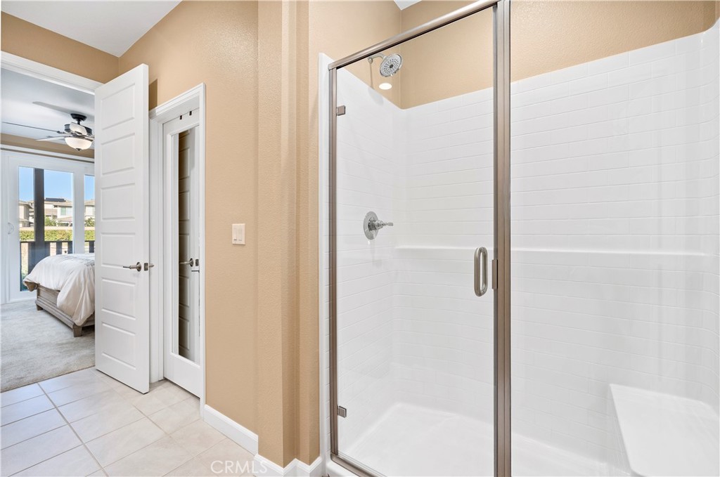 39320 Brunello Way Temecula, CA 92591 - Photo 21 of 52 a bathroom with a shower and a sink