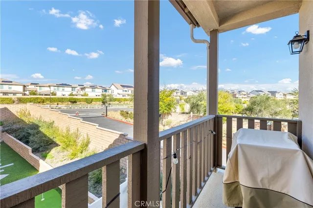 a view of a balcony with an ocean view
