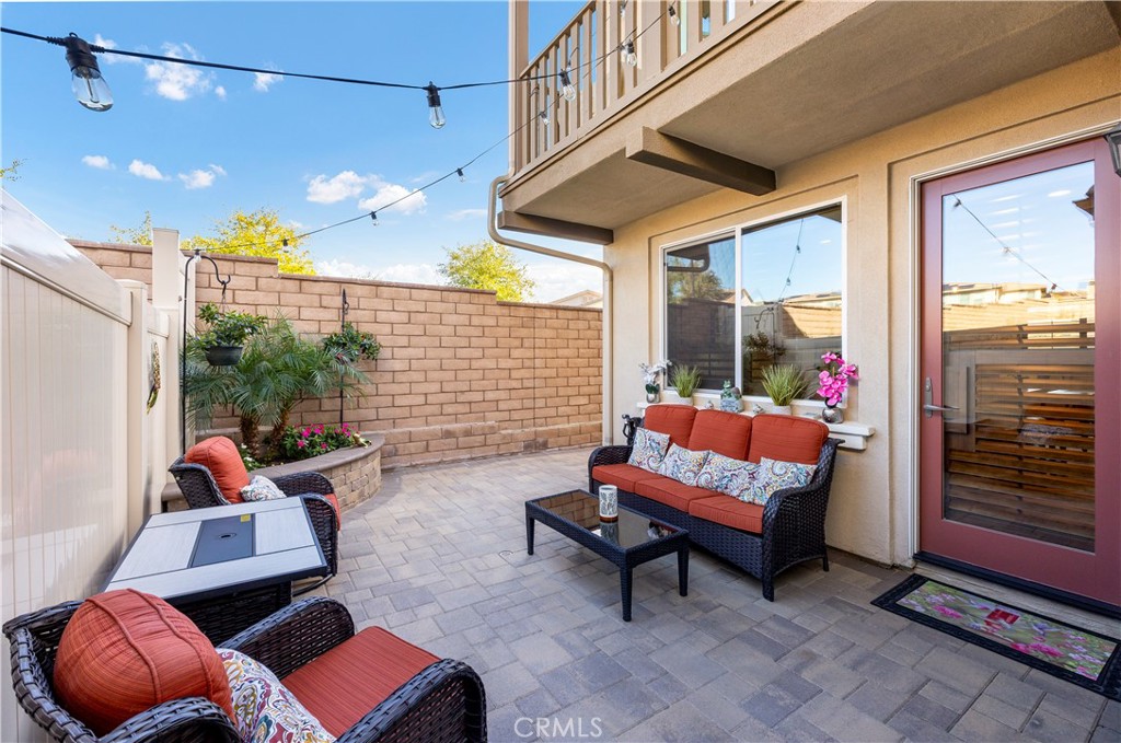39320 Brunello Way Temecula, CA 92591 - Photo 29 of 52 a outdoor space with patio furniture and a potted plant