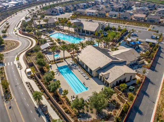 a view of a patio with swimming pool table and chairs