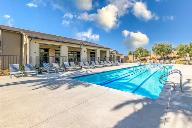 a view of a patio with swimming pool