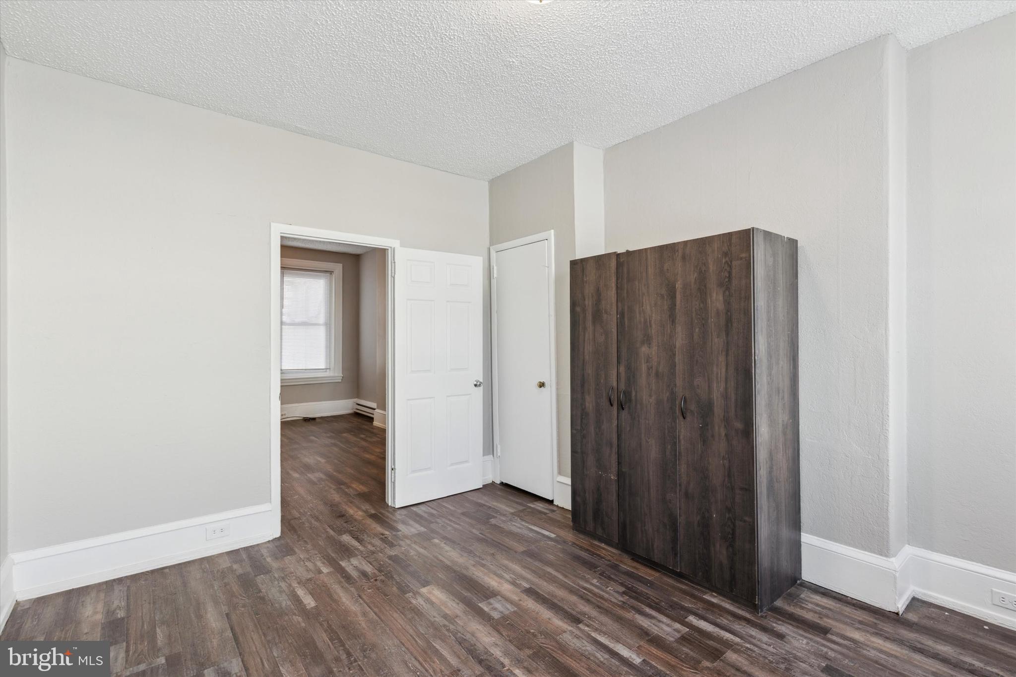 326 East Airy Street, Unit 1 Norristown, PA 19401 - Photo 4 of 11 a view of a hallway with wooden floor