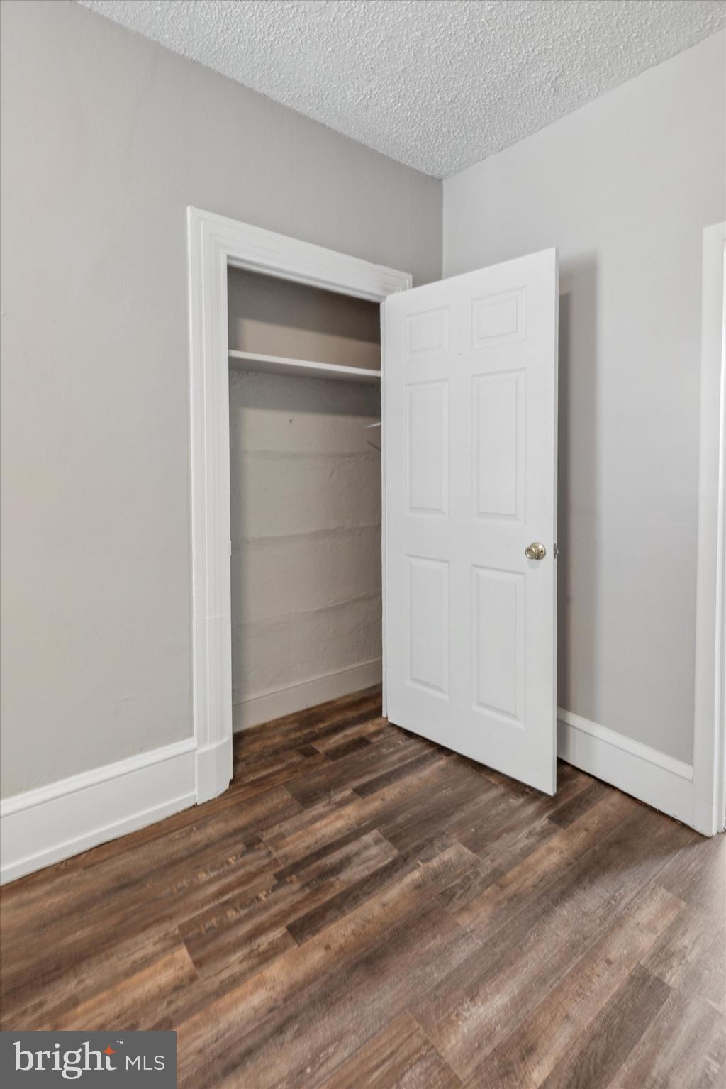 326 East Airy Street, Unit 1 Norristown, PA 19401 - Photo 9 of 11 an empty room with wooden floor & closet area