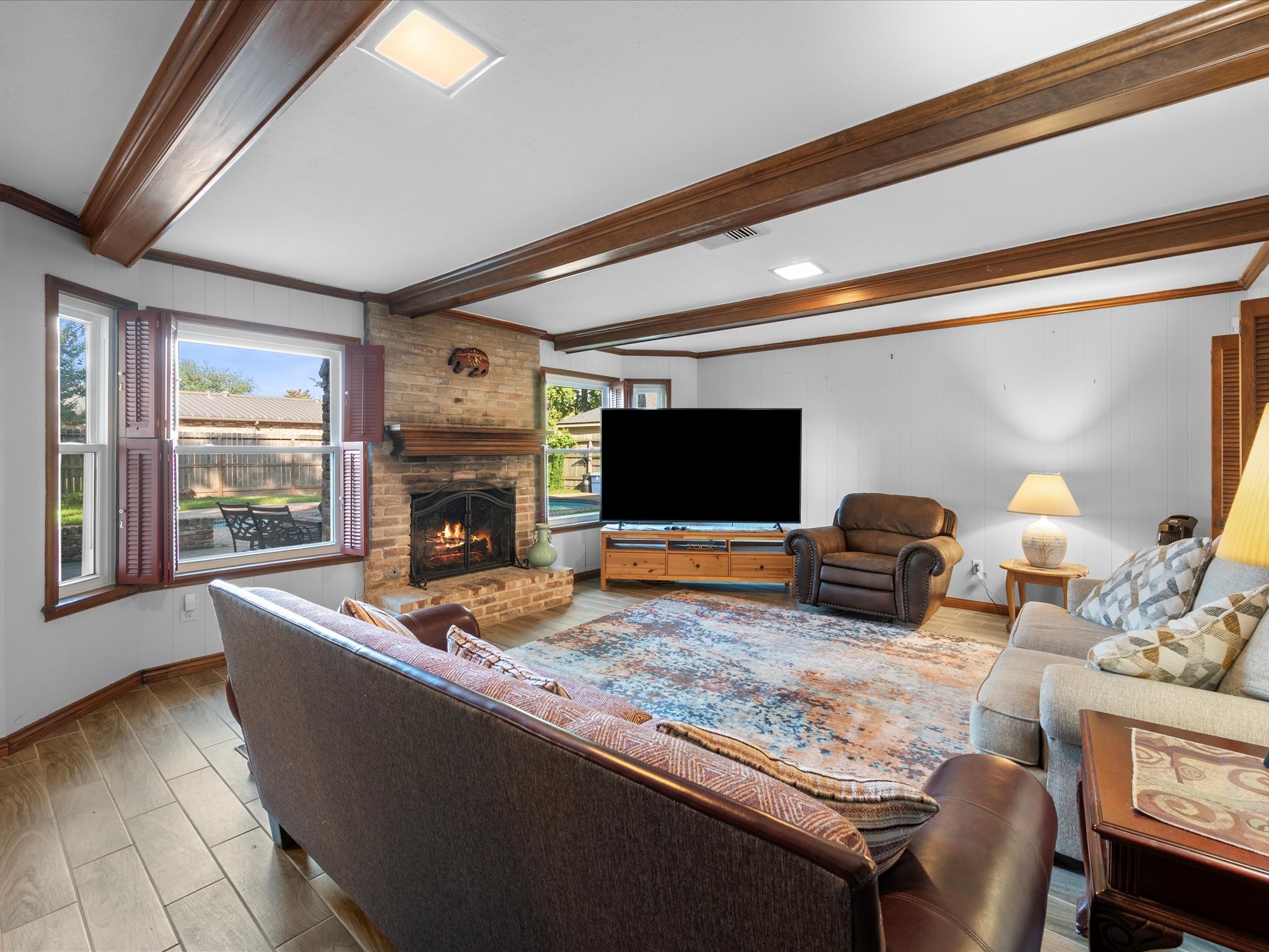 13718 Balmore Circle Houston, TX 77069 - Photo 14 of 35 a living room with furniture and a flat screen tv