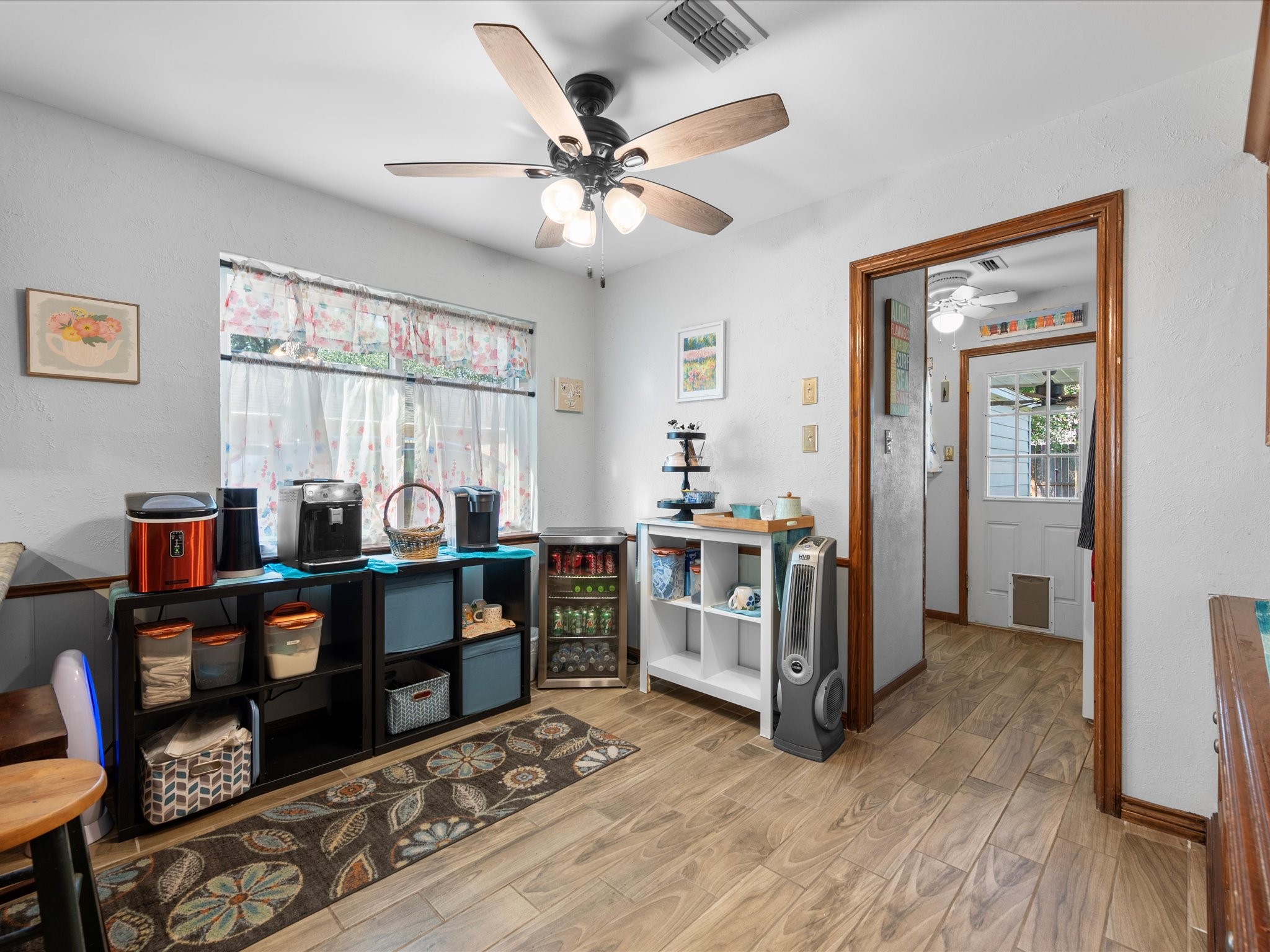 13718 Balmore Circle Houston, TX 77069 - Photo 18 of 35 a view of a room with window and wooden floor
