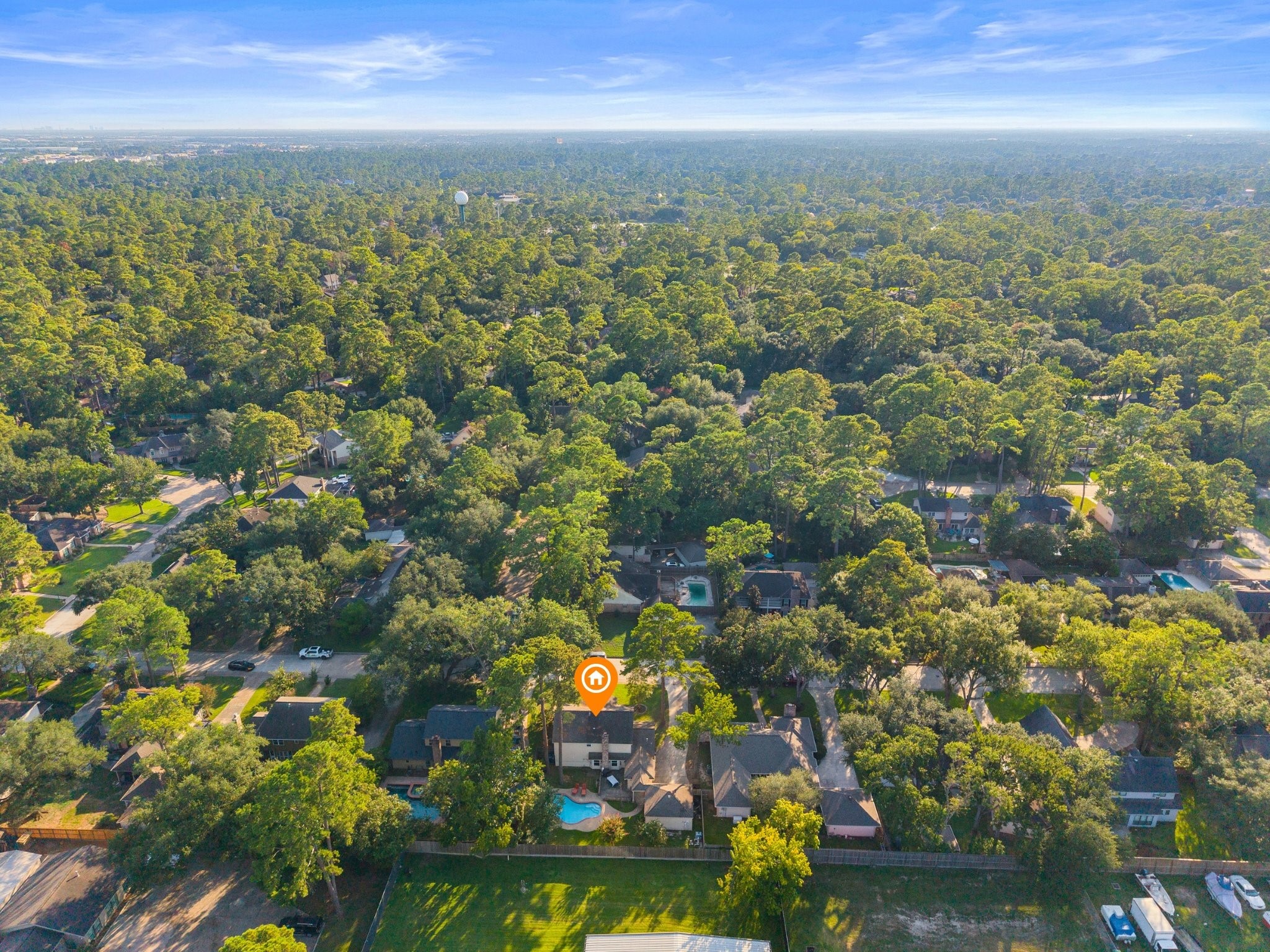 13718 Balmore Circle Houston, TX 77069 - Photo 30 of 35 an aerial view of residential houses with outdoor space and trees