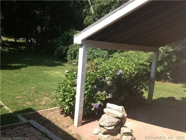 a view of hallway with windows