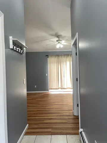 a bathroom with a shower and a toilet