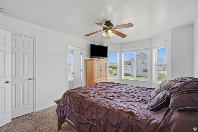 5576 South 4100th Street West Roy, UT 84067 - Photo 19 of 35 Primary bedroom