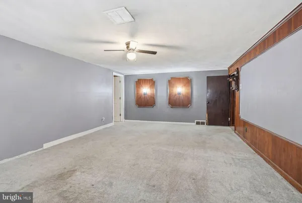 a view of hallway with stairs
