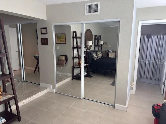 a view of a livingroom with a furniture and a window