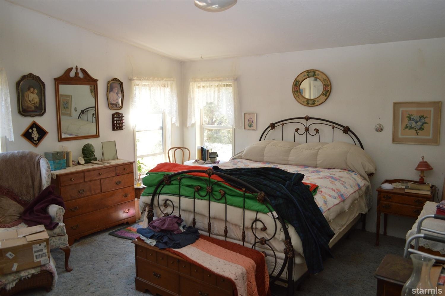 6000 Scossa Canyon Road Markleeville, CA 96120 - Photo 6 of 10 a bedroom with a bed a couch and a window