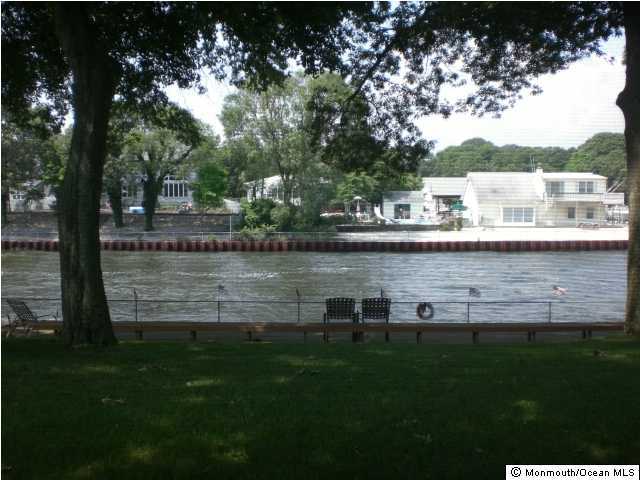 1501 Hulse Road, Unit 19 Point Pleasant, NJ 08742 - Photo 3 of 3 a view of a lake with houses
