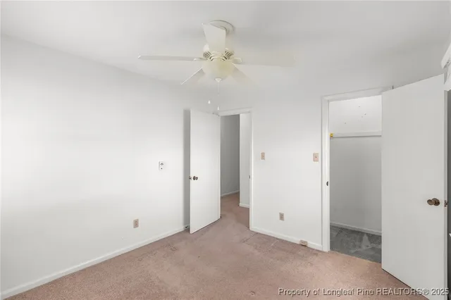 a bathroom with a sink toilet and mirror